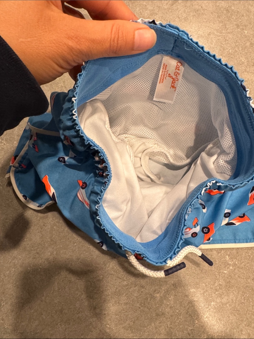 Cat & Jack Blue Boys Swim Trunks with Orange and White Race Cars - Picture 4 of 4